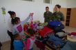 Slovensk a esk vojaci rozdvali v martinskch Bambuskch humanitn pomoc 6